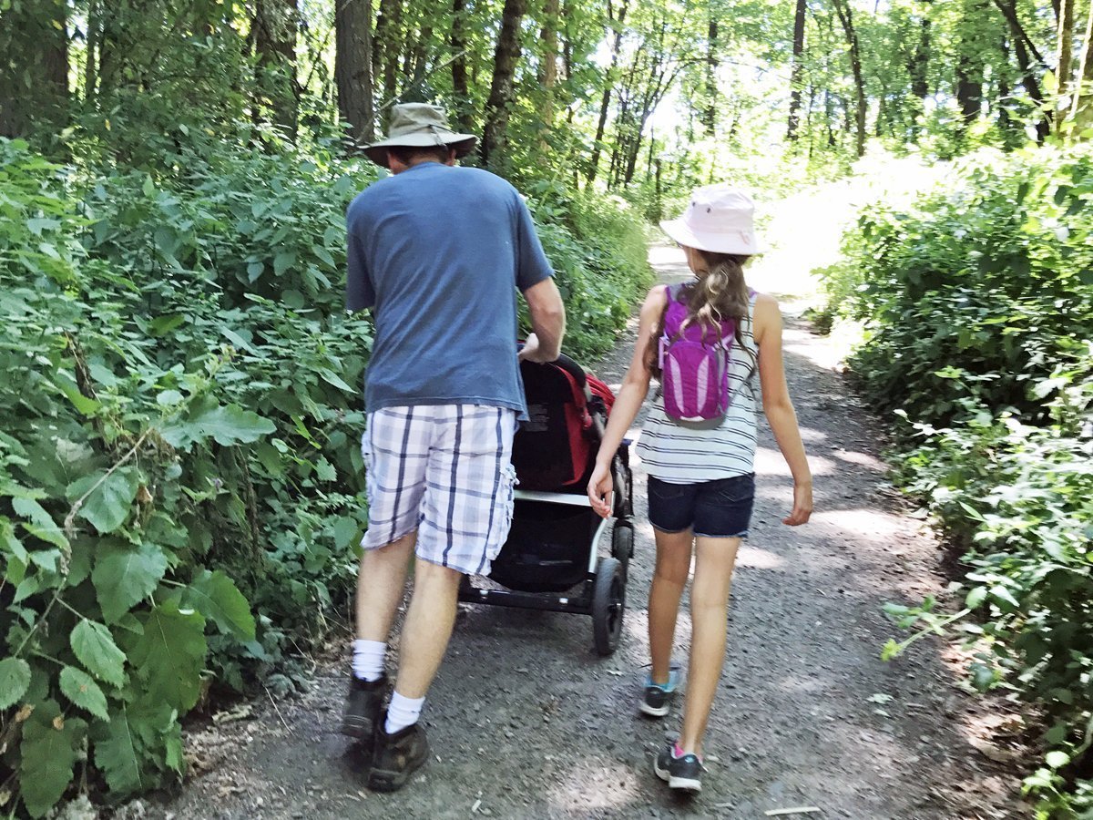 My family out for a hike on a stroller-friendly trail near Eugene